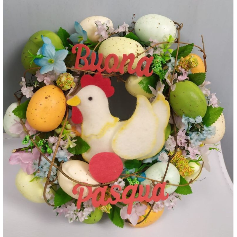 Ghirlanda fuoriporta con uova colorate gallina e fiori di pesco