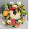 Ghirlanda fuoriporta con uova colorate gallina e fiori di pesco